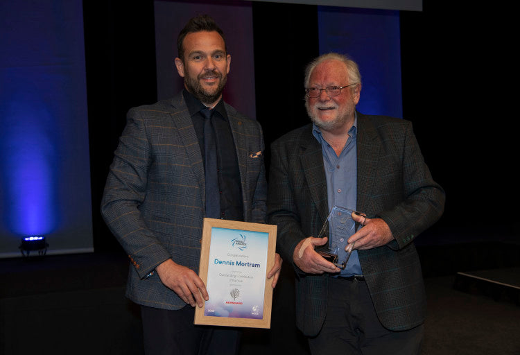 Dennis Mortram (right) was presented with the Outstanding Contribution of the Year Award by Steven Nixon of Bernhard and Company.jpg