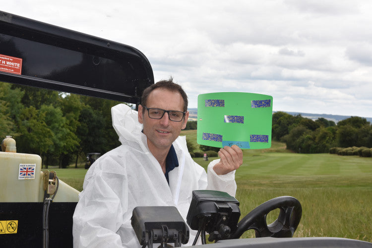 Glenn Kirby with water sensitive paper test.jpg
